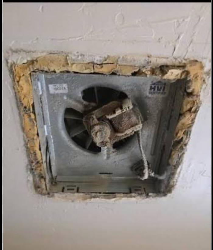 Old bathroom ceiling fan vent before the fan was replaced
